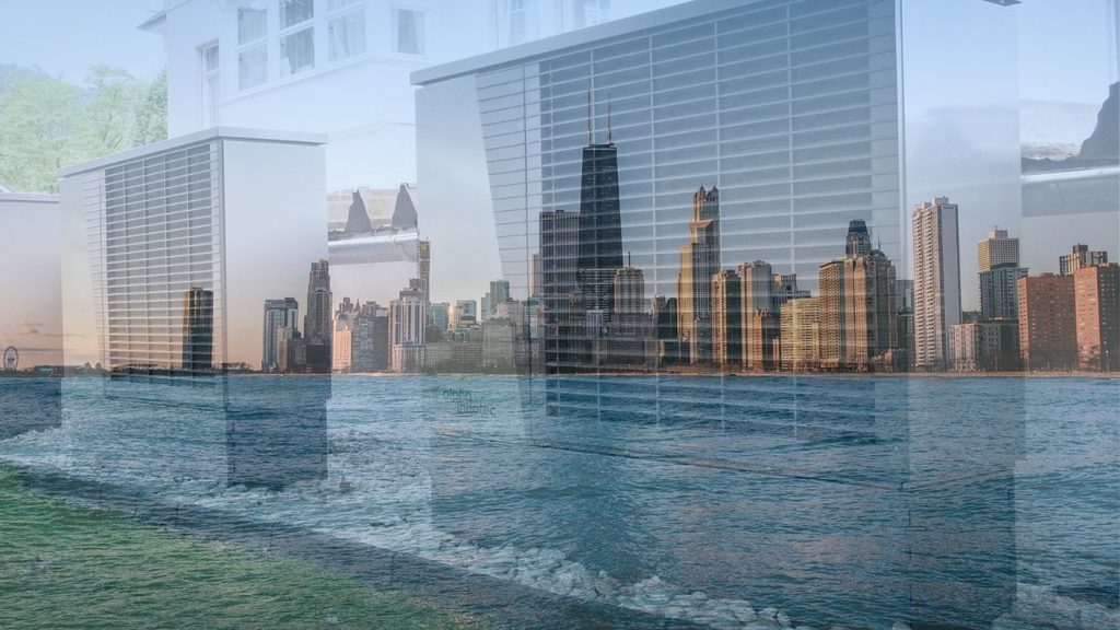 Chicago skyline reflected in glass
