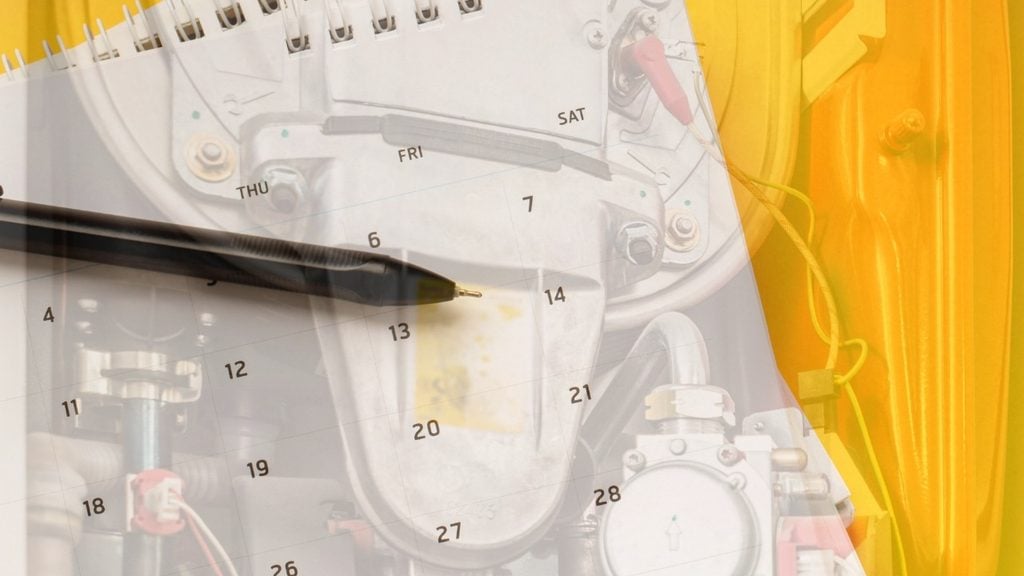 Technician writing notes on a furnace inspection form