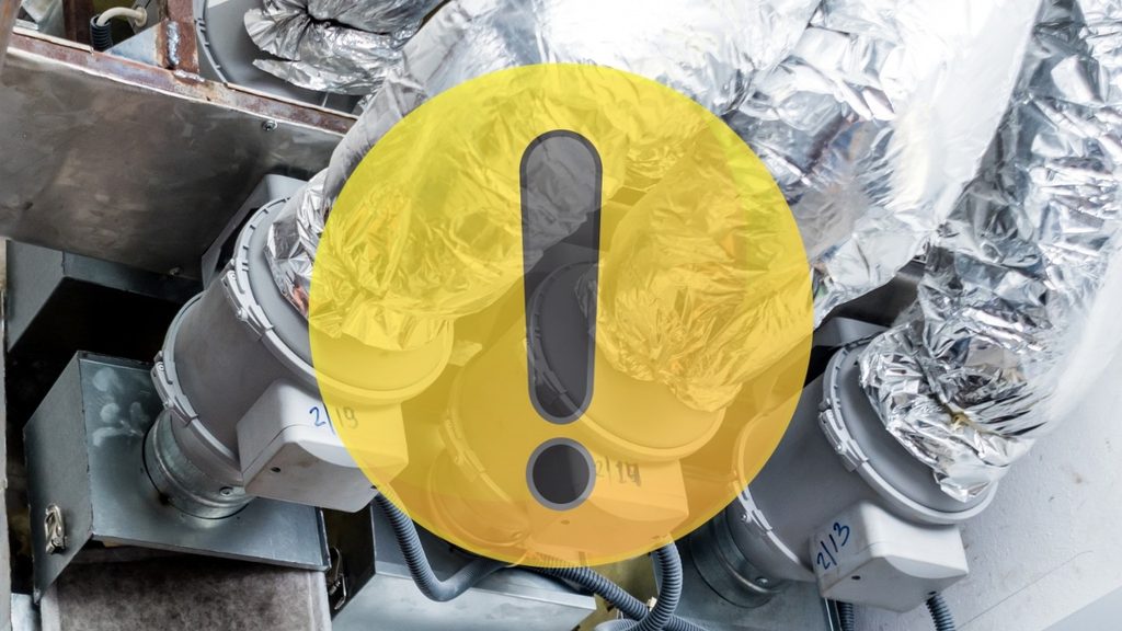 Ductwork with a warning icon