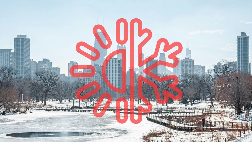 Snowy Chicago skyline with a frost icon